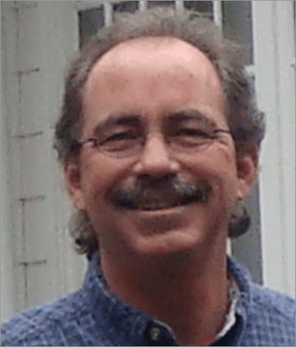 dave Headshot of Dave Black, a white man with glasses and mustache.