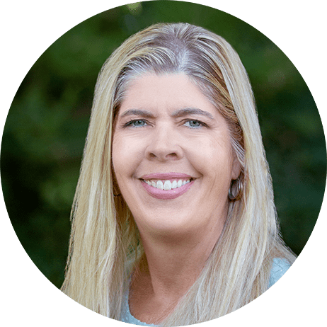 Photograph: Circular headshot of Wise TA & Training Director, Monica Zumach.